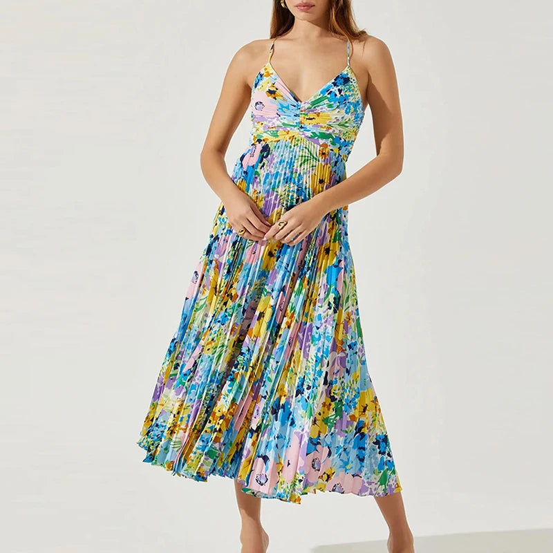 Vestido midi elegante con pliegues y estampado floral