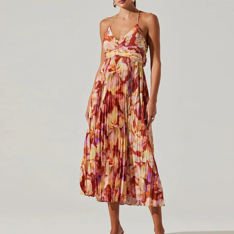 Vestido midi elegante con pliegues y estampado floral